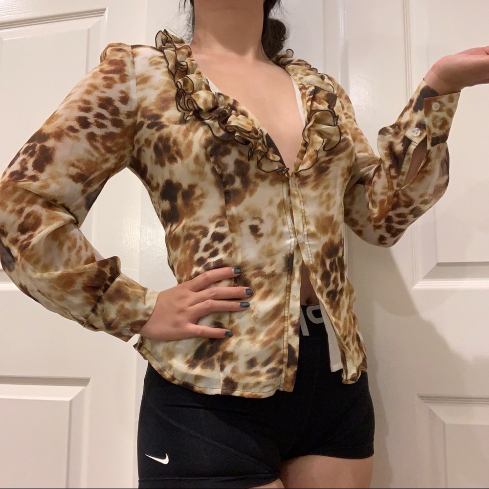 Cheetah print silk shirt.